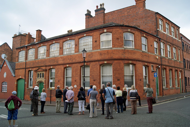 The group views Victoria Works built in 1839-40